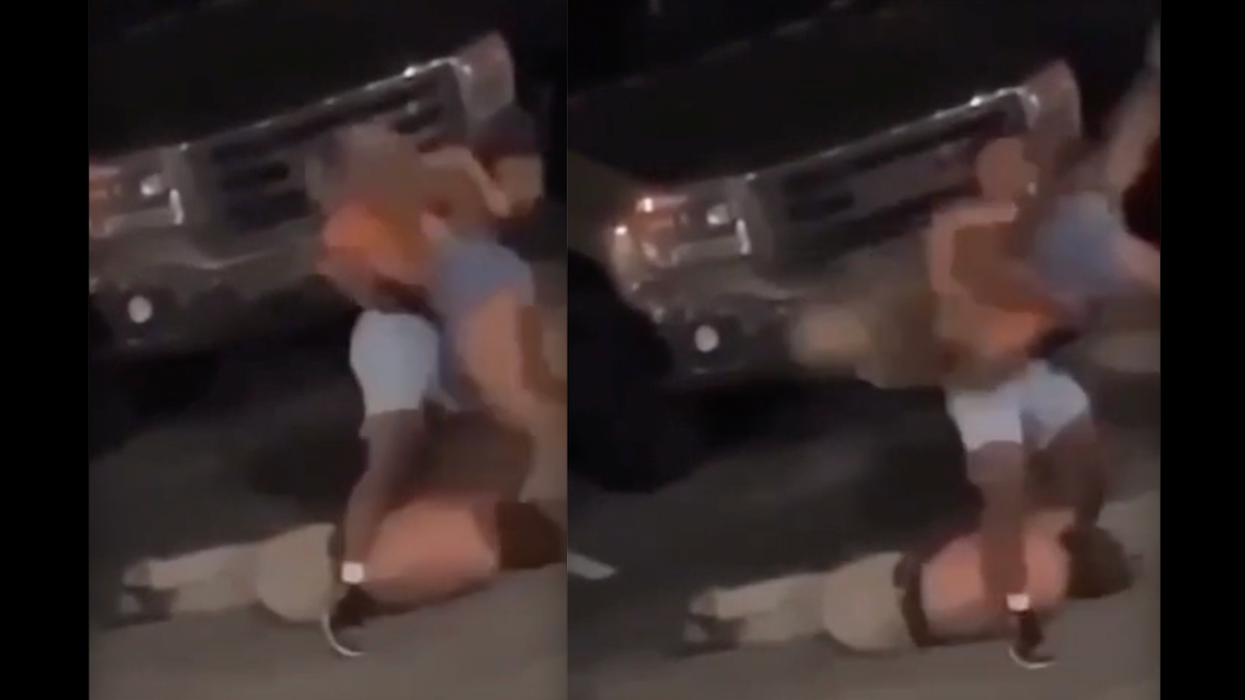 Video: Male brutally body-slams female on parking lot surface after she tries to end attacker's beatdown of another male