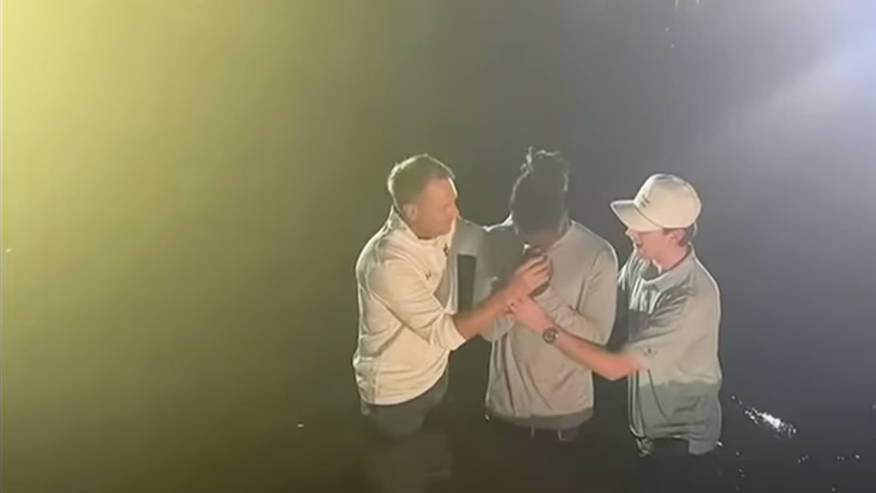 Anti-religious group claims Auburn University's football coach attending massive Christian revival on campus is 'unconstitutional'