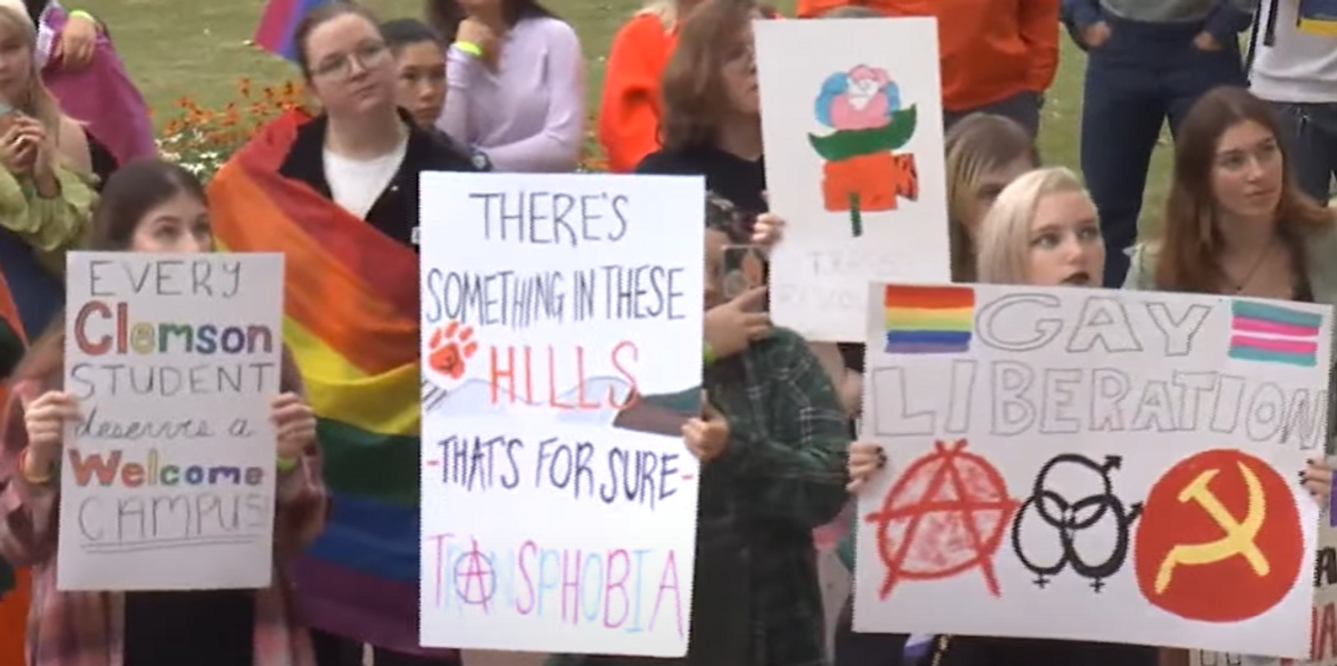LGBTQ students march against Clemson University removing tampons from men's  bathrooms, demand 'repercussions' against Republican group