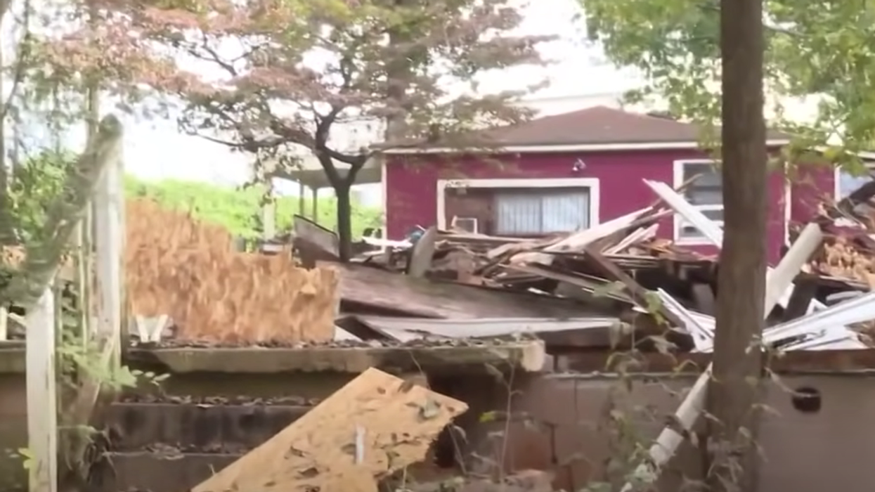 Woman finds home demolished after returning home from vacation