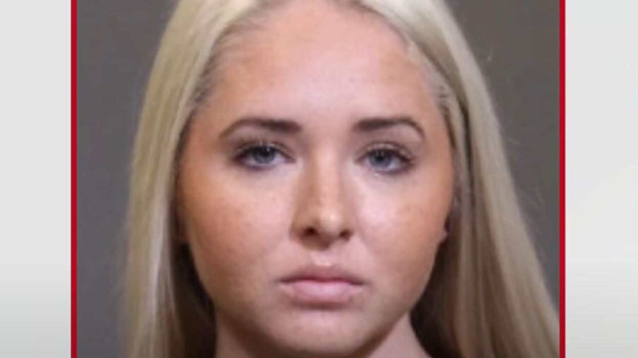 Ex-social worker, already accused of sexually abusing 13-year-old, now faces intimidation charges after showing up at boy's home with gun