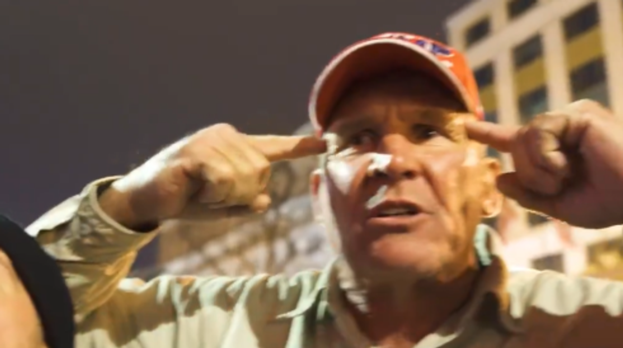 Newly surfaced J6 video shows Ray Epps whisper to right-wing influencer: 'We're here to storm the Capitol'