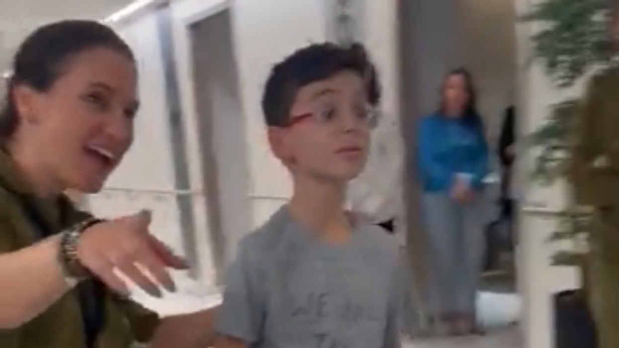 17 hostages released by Hamas as video of 9-year-old Israeli boy reuniting with his father goes viral