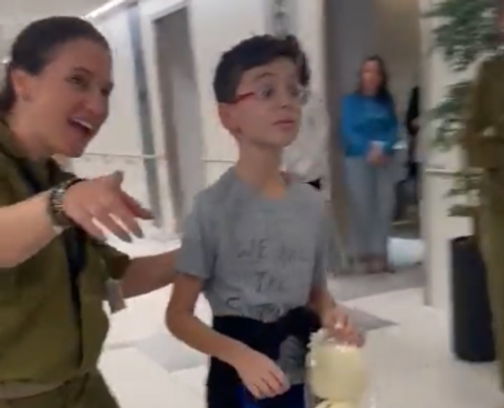 17 hostages released by Hamas as video of 9-year-old Israeli boy reuniting with his father goes viral
