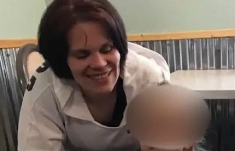 Iowa mother loses legs‚ needs facial reconstructive surgery after attack by 3 pit bulls‚ officer shoots dogs dead