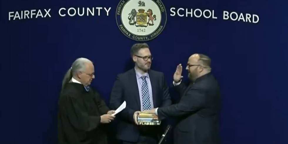 Democrat school board member sworn in on stack of 'LGBT' literature‚ including book titled 'Flamer'