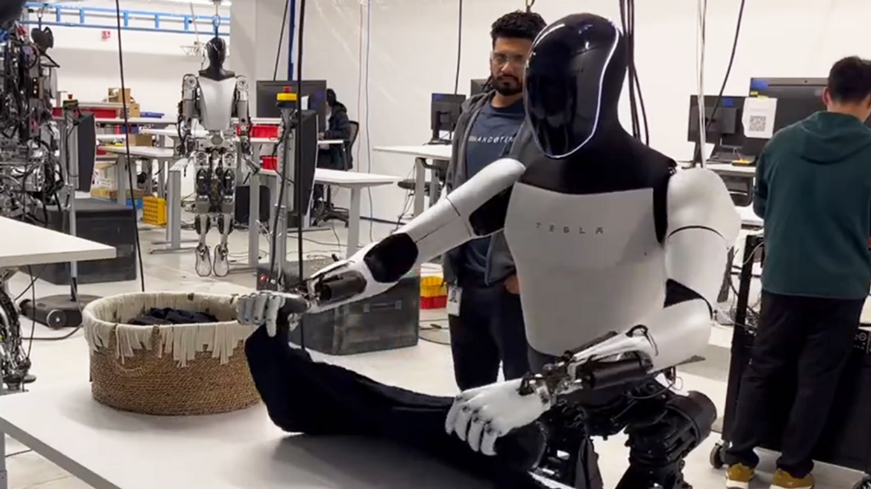 Tesla robot pictured folding laundry just months after technology was revealed