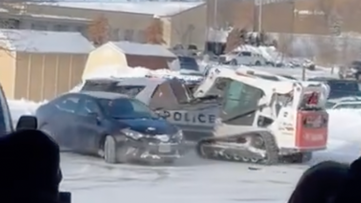 Wild video: Rampaging male uses skid loader to smash police cruiser, other vehicles in multiple parking lots