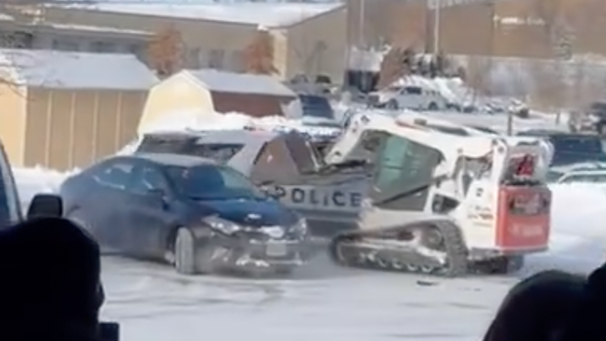 Wild video: Rampaging male uses skid loader to smash police cruiser, other vehicles in multiple parking lots