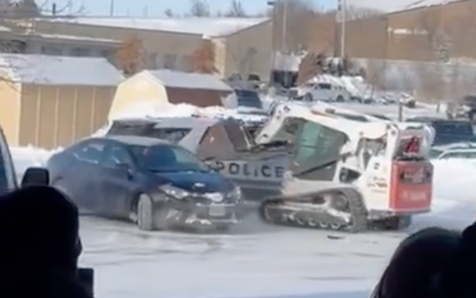 Wild video: Rampaging male uses skid loader to smash police cruiser‚ other vehicles in multiple parking lots