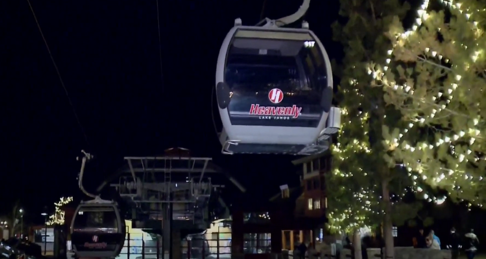 A female snowboarder spent 15 hours locked in a ski gondola in freezing temperatures‚ rubbed hands and feet together