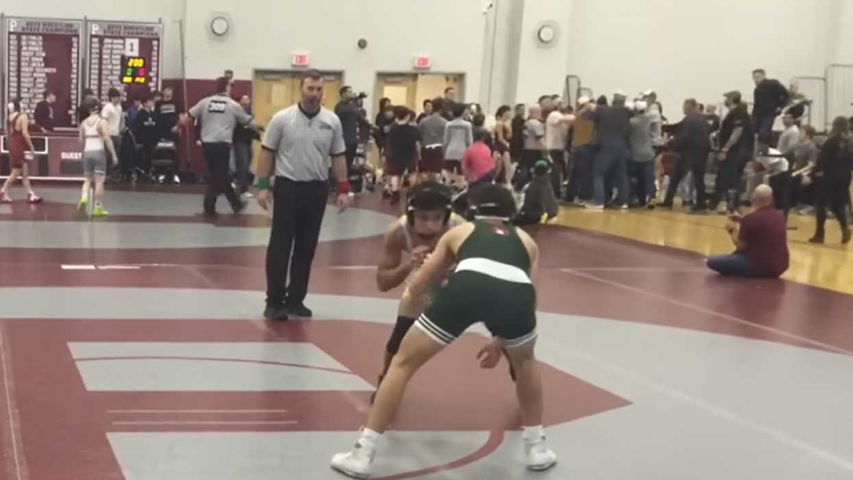 Watch: Shocking, bleacher-clearing brawl between parents erupts in the middle of high school wrestling match