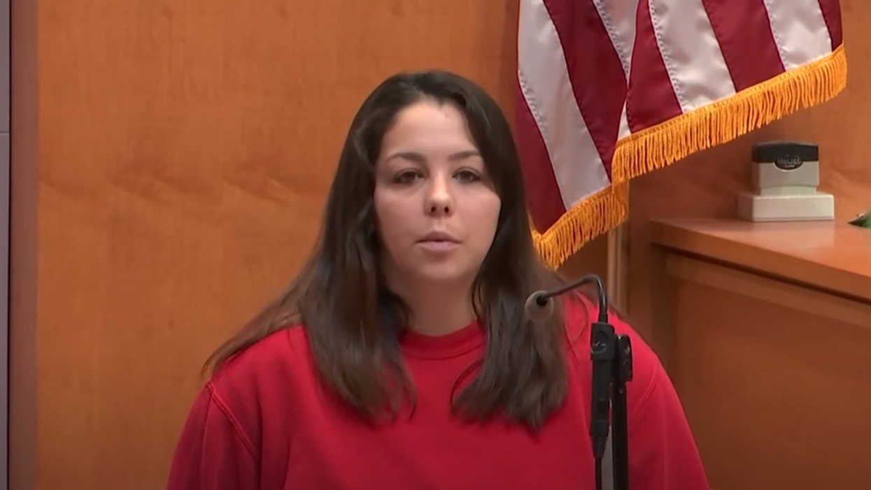 A stepmother says her husband punched his 5-year-old daughter to death. His lawyers claim she's lying.
