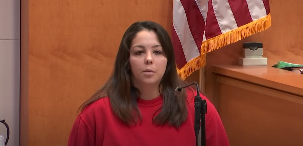 A stepmother says her husband punched his 5-year-old daughter to death. His lawyers claim she's lying.