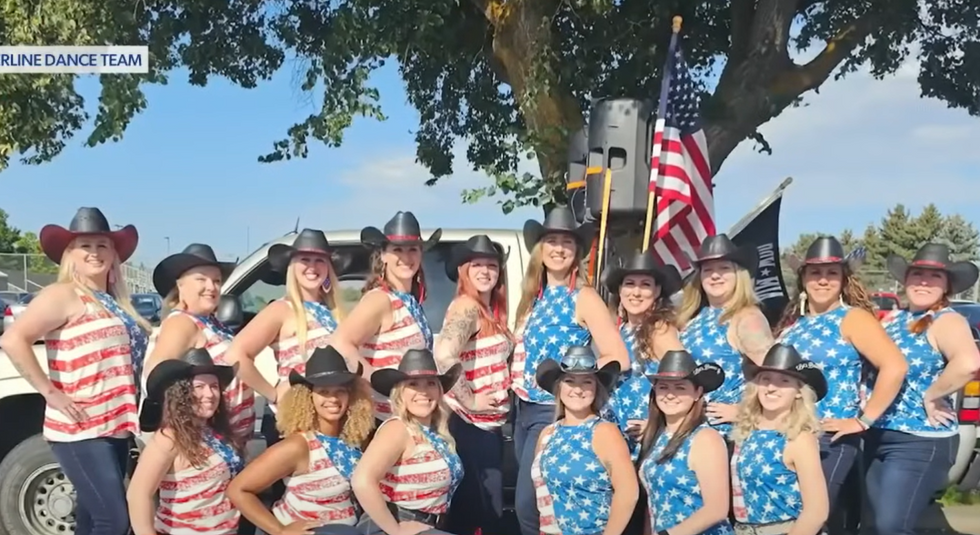 Seattle line dancing squad says they were booted from competition because their American flag shirts made crowd &apos;triggered and unsafe&apos;