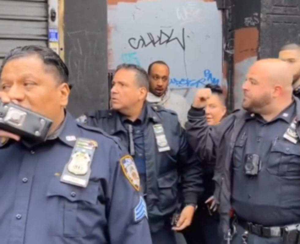 Video: Suspect accused of slashing 11-year-old girl needs NYPD officers to protect him from angry mob