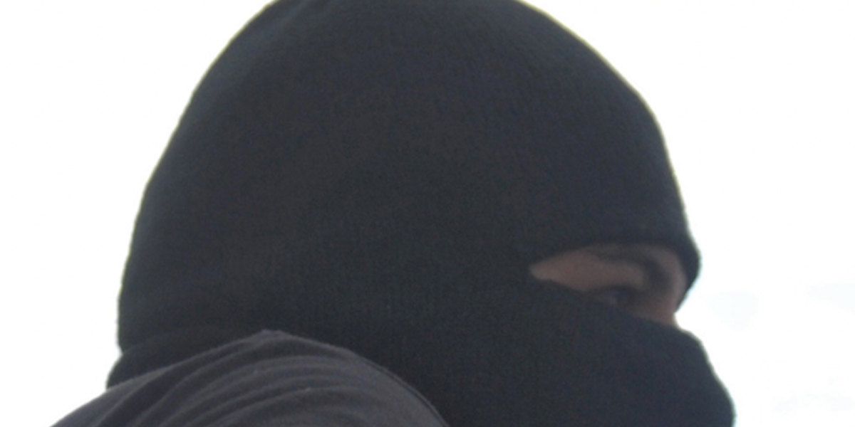 Video: Ski-masked thug flattens woman with flying kick from behind; punches and stomps her as she screams in parking lot Video: Ski-masked thug flattens woman with flying kick from behind; punches and stomps her as she screams in parking lot