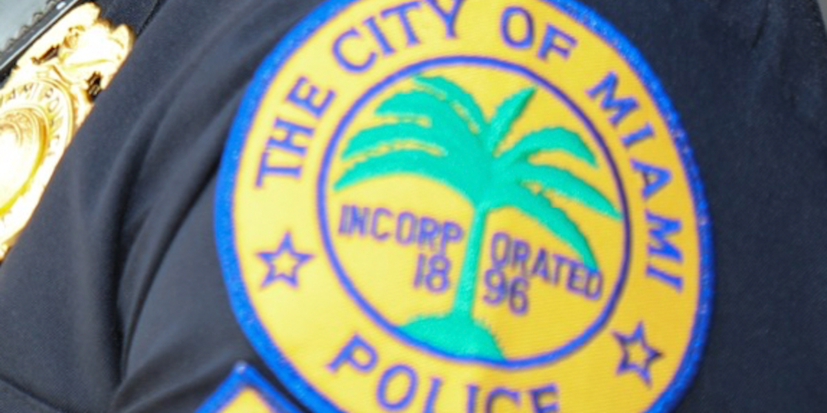 Wild video: Florida cop clings to hood of moving car, shoots through windshield on busy downtown street in broad daylight Wild video: Florida cop clings to hood of moving car, shoots through windshield on busy downtown street in broad daylight