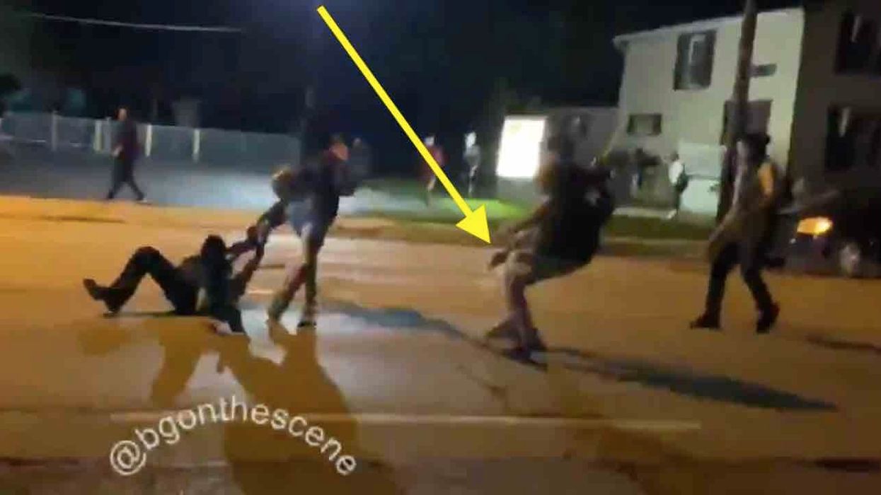 Images show man with badly shot arm was pointing handgun at shooter while chasing him with mob in Kenosha