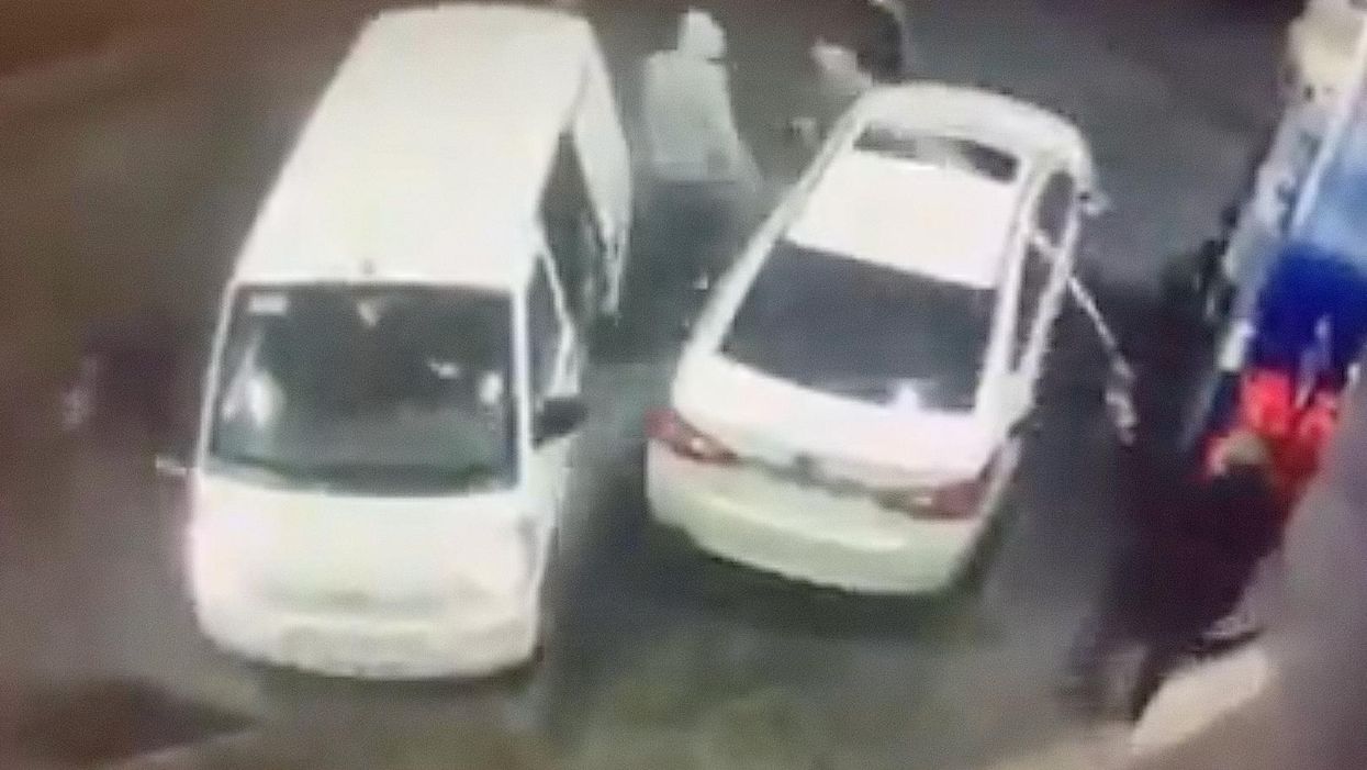 Incredible video captures the moment man at a gas station sprays would-be robbers with gasoline during botched carjacking attempt