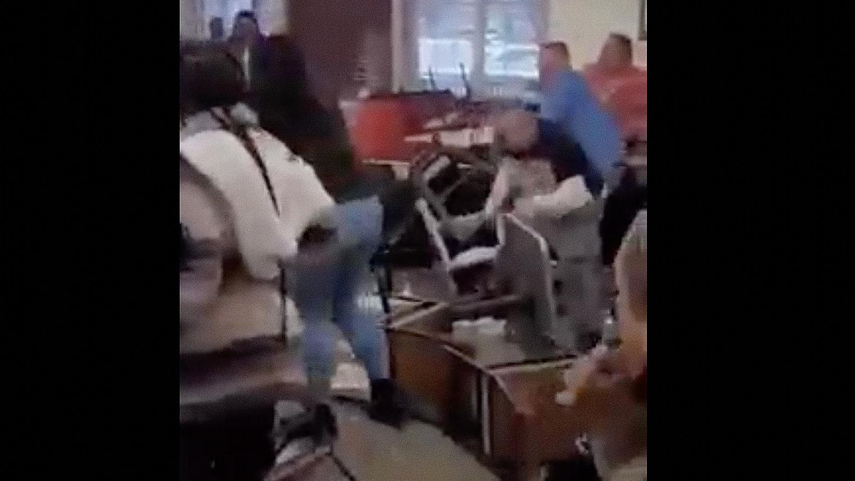 Insane video captures the moment a huge, 40-person brawl breaks out at Golden Corral restaurant
