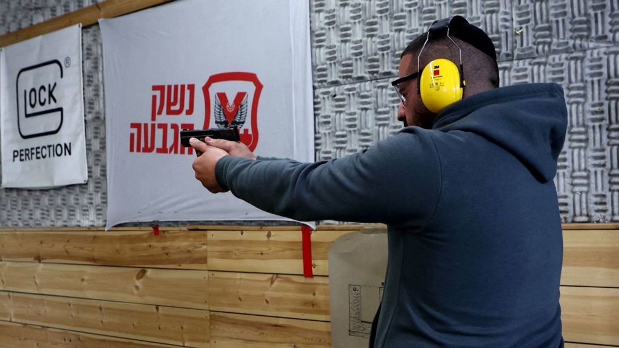 Israel relaxes gun laws to increase number of armed and ready citizens in wake of terrorist attacks