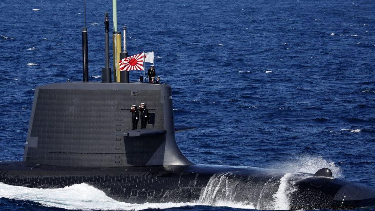 Japan drops pacifist pretensions, unveils $320 billion plan to ready its military for possible conflict with China