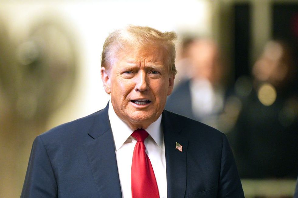 Judge holds Trump in contempt‚ claims he violated gag order