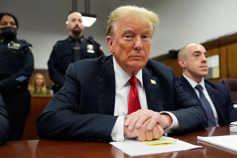 Judge Merchan tells jurors they don't need to agree on 'unlawful means' to convict Trump