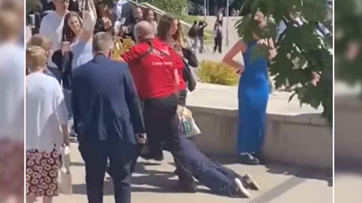 Just Stop Oil activist dragged away after disrupting his own graduation ceremony, but waited to receive his diploma first