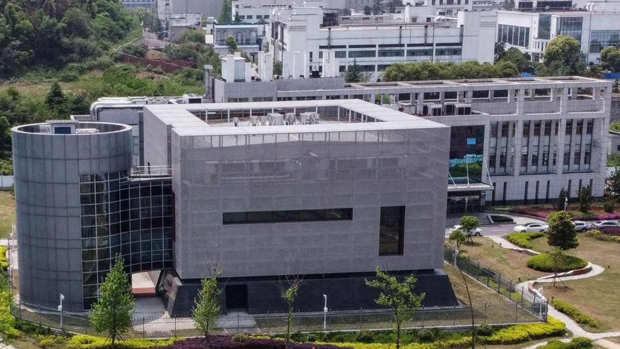 Just weeks after entering Wuhan to investigate, WHO claims 'extremely unlikely' COVID came from infamous lab