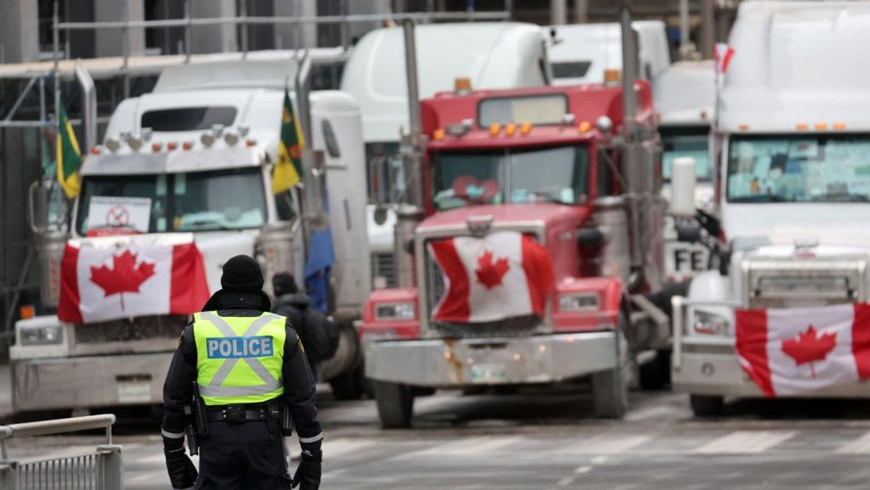 Key Freedom Convoy leaders arrested as police establish 100 checkpoints in Ottawa to clamp down on trucker protest