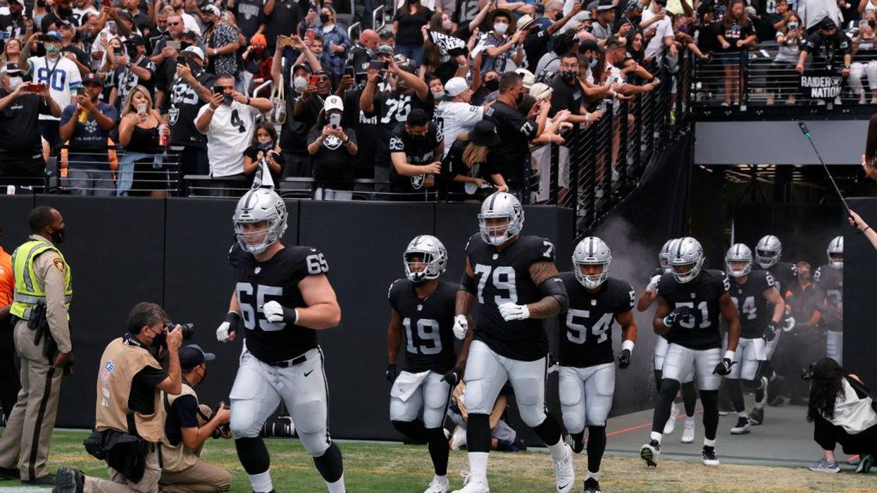 Las Vegas Raiders mandate vaccines for home games, offer to jab fans in the parking lot before games — then they can enter with masks