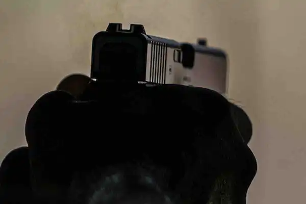 Last year a concealed-carrying garbage truck driver opened fire on 2 robbers, killing 1. The survivor just learned his fate.