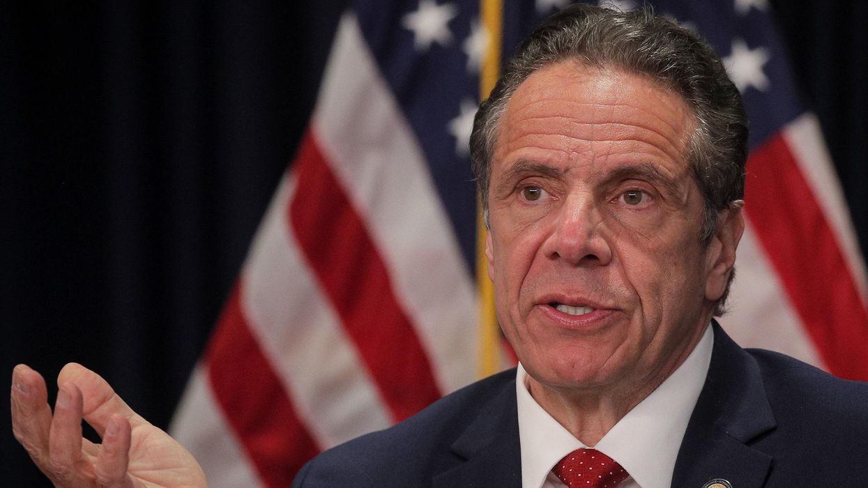 Latest Cuomo accuser complains of unwanted kiss. Governor's lawyer says he does it all the time.