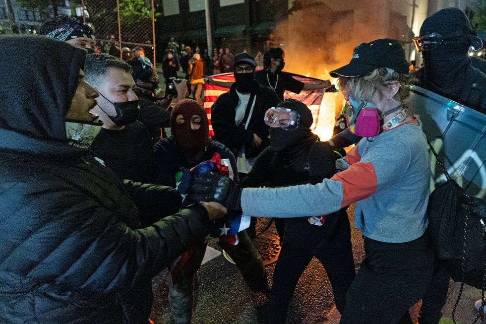 Left-wing activist arrested in brutal attack on reporter at anti-ICE protest in Seattle