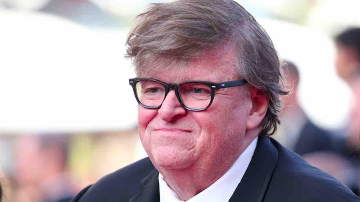 Leftist filmmaker Michael Moore says US must defend democracy 'against our own domestic Taliban,' apologizes for American wars