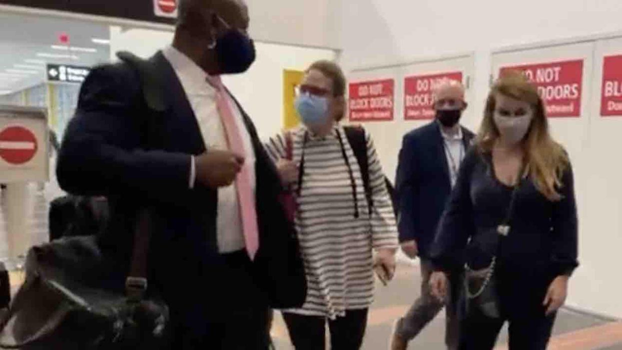 Leftists lose it when Sen. Kyrsten Sinema ignores one of her 'constituents' harassing her in airport — and speaks to Republican Sen. Tim Scott instead