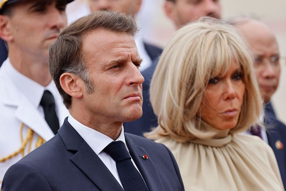 Macron's office initially denies authenticity of video showing French president's manhandling by his geriatric wife