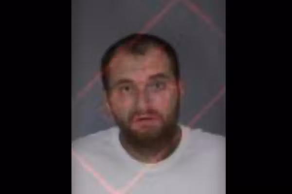 Male on parole accused of breaking into home in broad daylight. But gun-toting homeowner isn't having a bit of it.