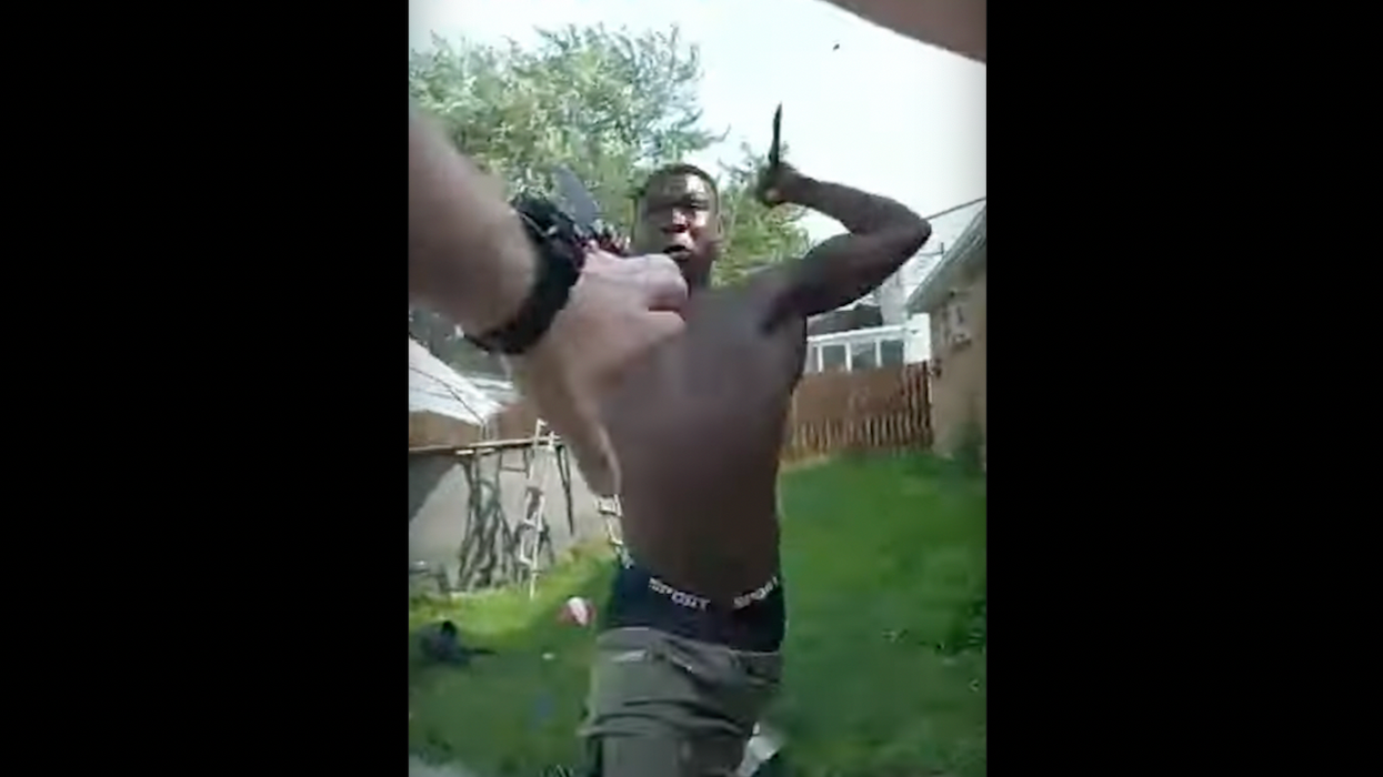 Male wielding 2 knives caught on police bodycam video jumping from window, running at cop, stabbing officer