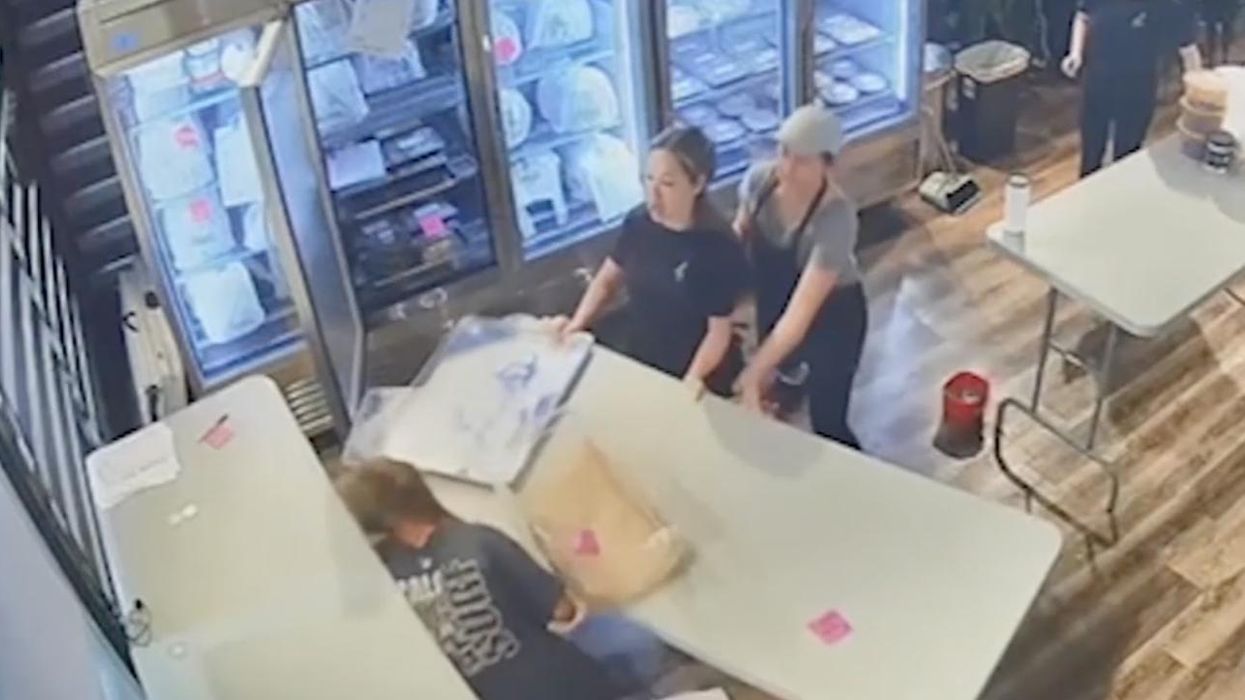 'Mama bear just sprung into action': Instincts kick in for mother, daughter who fight intruder in their store — and it's all caught on video