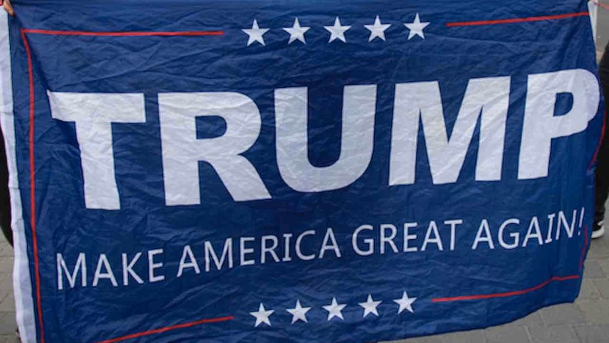 Man, 60, tells cops he burned Trump flag hanging from home during paper route because he was 'angry'
