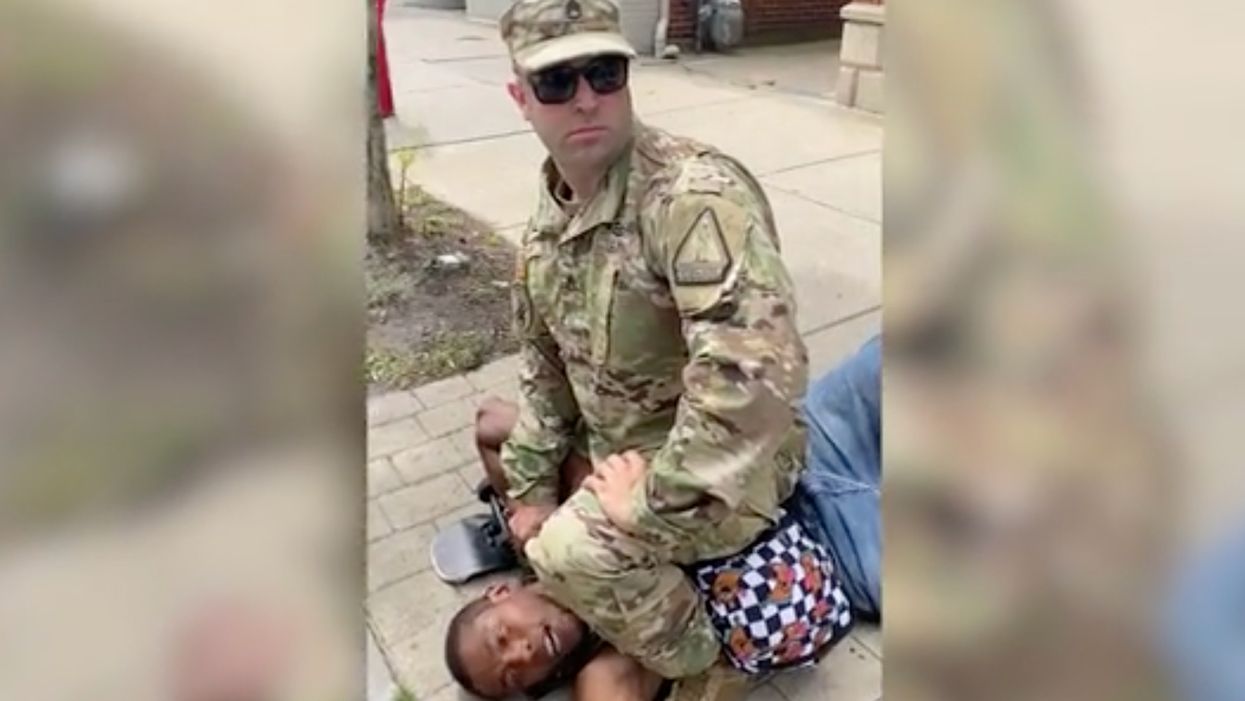 Man in military fatigues flattens man with haymaker, sits on his chest after suspect reportedly spits on car, disparages military