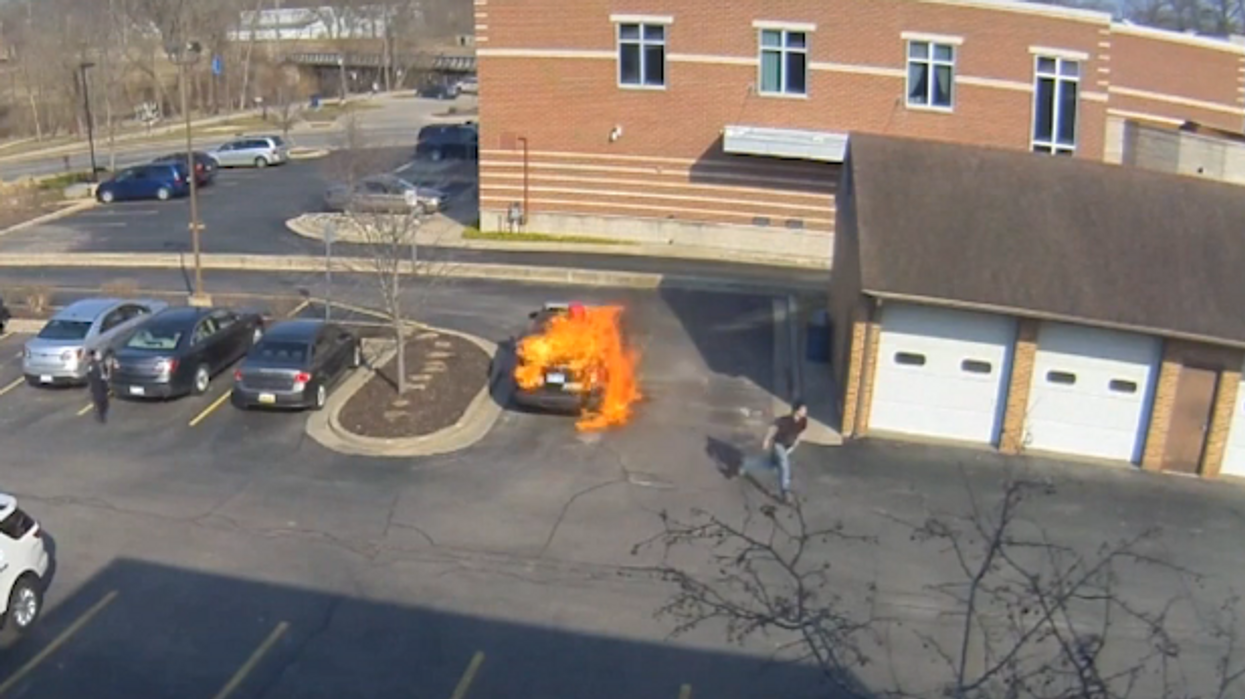 Man sets police car on fire in broad daylight outside city hall — then immediately gets arrested