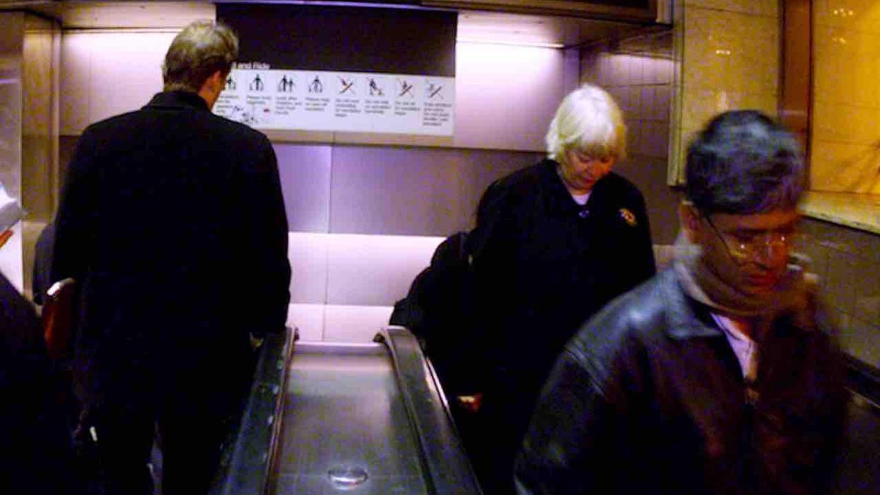 Man tries to get past couple blocking escalator at Brooklyn train station — but the couple wouldn't let him through. Then he's stabbed in stomach amid argument.