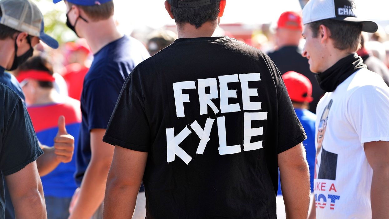 Man wearing "Free Kyle" T-shirt