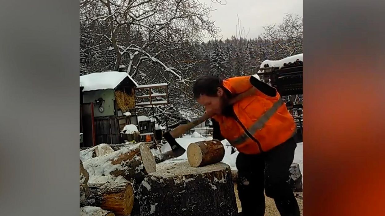 Man who lost both arms at the age of 12 goes viral for his video chopping wood
