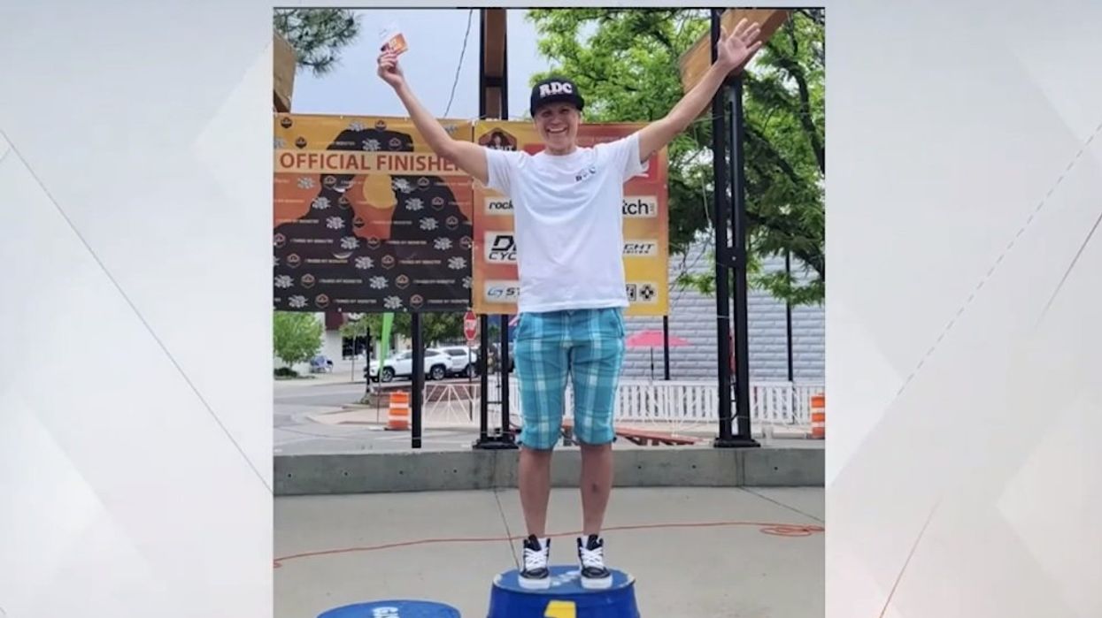 Man who won women's cycling race stands alone on podium after female competitors refuse to join him