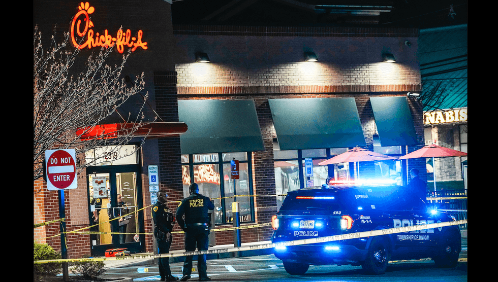 Masked men open fire after storming into Chick-fil-A; 1 dead, 6 injured; manhunt underway